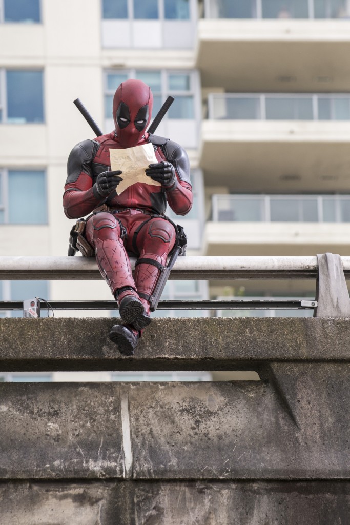 DEADPOOL Ryan Reynolds as Deadpool relaxes before leaping into battle. Photo Credit: David Dolsen TM & © 2015 Marvel & Subs.  TM and © 2015 Twentieth Century Fox Film Corporation.  All rights reserved.  Not for sale or duplication.
