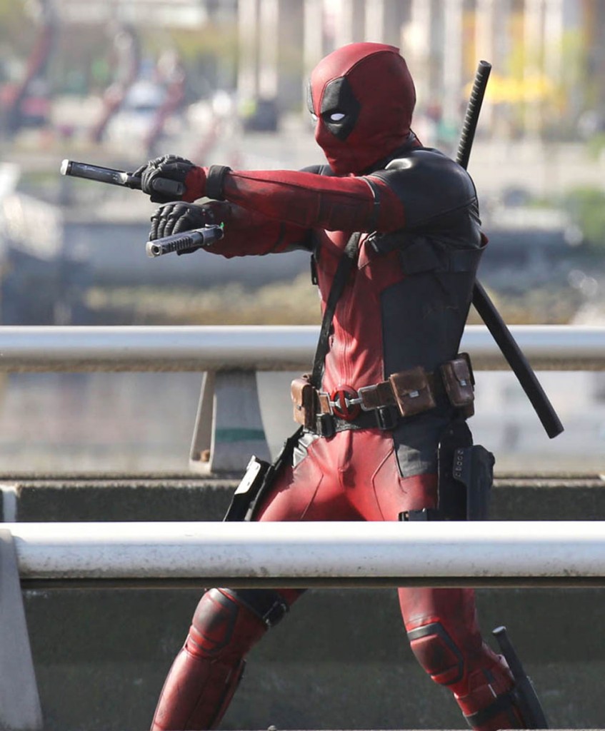 51703768 Actor Ryan Reynolds suits up to film and action scene on a viaduct for "Deadpool" on April 7, 2015 in Vancouver, Canada. The new Marvel movie tells the story of a former Special Forces operative turned mercenary who is subjected to a rogue experiment that leaves him with accelerated healing powers. FameFlynet, Inc - Beverly Hills, CA, USA - +1 (818) 307-4813