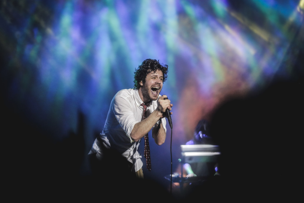 Without catching a break, Michael Angelakos walked the crowd through the band’s biggest hits like “Sleepyhead,” “Take a Walk,” and “Constant Conversations.” | Photo by Tristan Tamayo