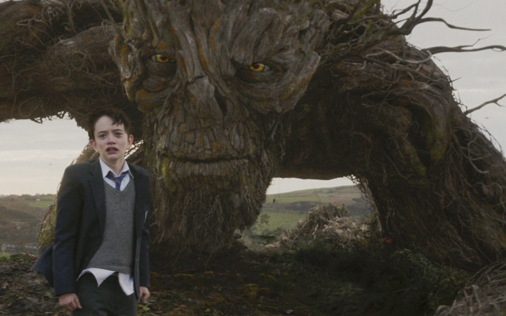 lewis macdougall and liam neeson (voice of monster) - A MONSTER CALLS