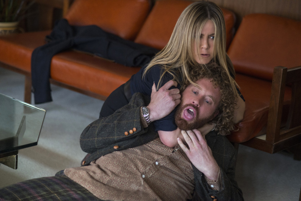 Jennifer Aniston as Carol Vanstone and T.J. Miller as Clay Vanstone in OFFICE CHRISTMAS PARTY by Paramount Pictures, DreamWorks Pictures, and Reliance Entertainment