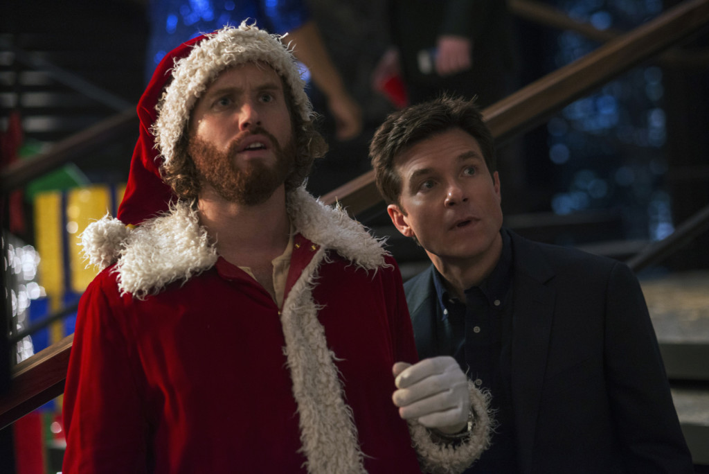 L-R: T.J. Miller as Clay Vanstone, Jason Bateman as Josh Parker in OFFICE CHRISTMAS PARTY by Paramount Pictures, DreamWorks Pictures, and Reliance Entertainment