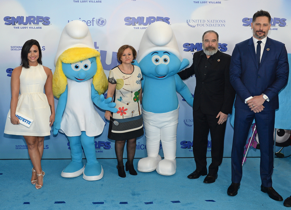 NEW YORK, NY - MARCH 18:  (L-R) Demi Lovato, Under-Secretary-General for Communications and Public Information Cristina Gallach, Mandy Patinkin, and Joe Manganiello at the United Nations Headquarters celebrating International Day of Happiness in conjunction with SMURFS: THE LOST VILLAGE on March 18, 2017 in New York City.  (Photo by Andrew Toth/Getty Images for Sony Pictures)