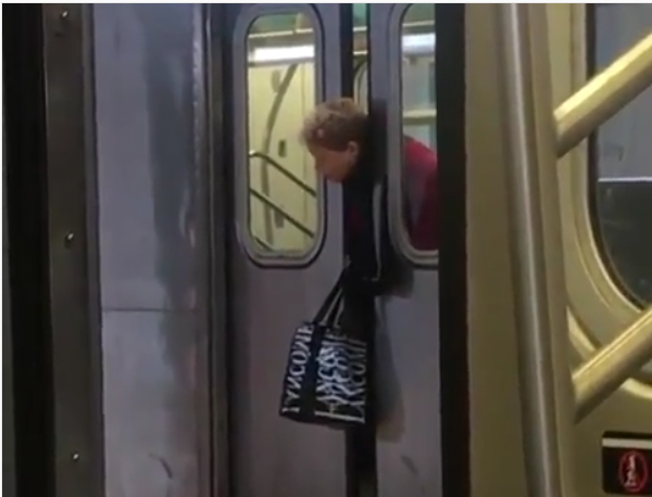 Lady, Head, Stuck, NYC, subway, passer-by