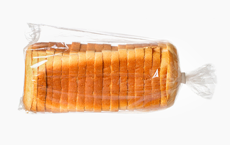 sliced bread in a plastic bag on white surface