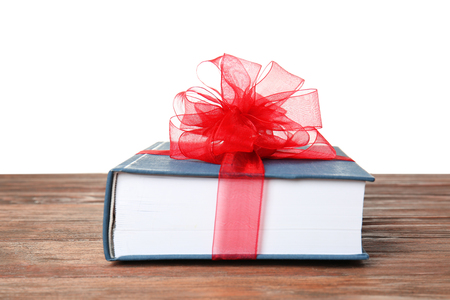 Principal gives books to students on birthdays