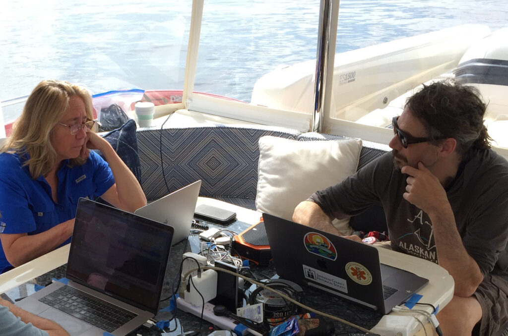Dr. Brenda McCowan and Dr. Fred Sharpe at work onboard the Blue Pearl, image credit: Jodi Frediani
