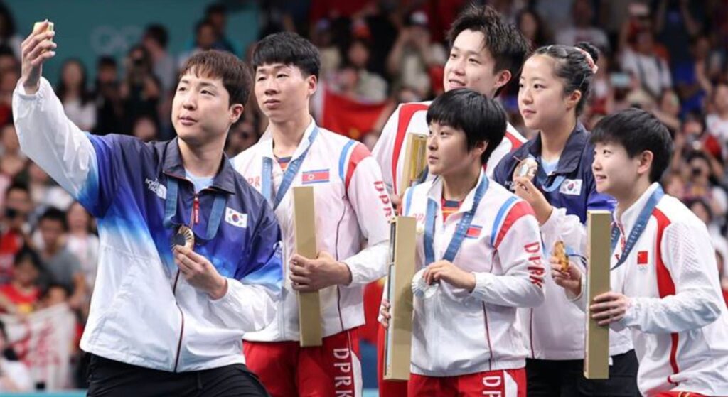 North Korean olympians under investigation after taking selfies with South Korean athletes