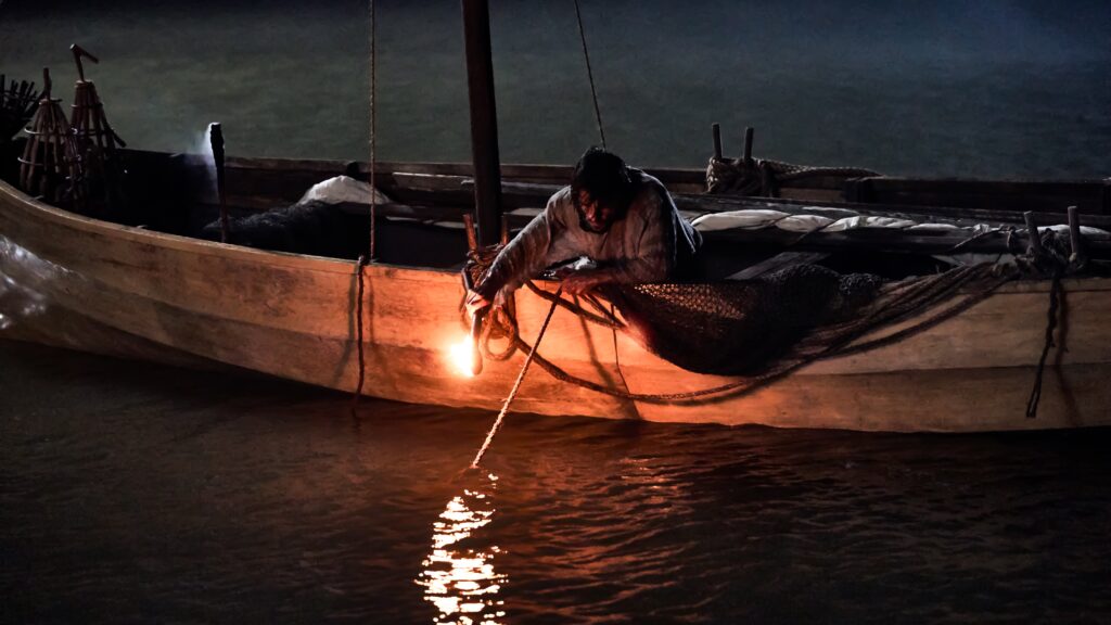 Simon fishing at night